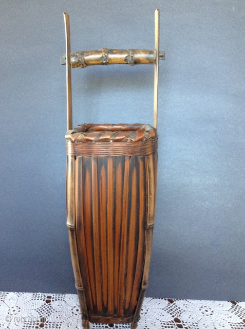 Japanese Bamboo Basket, probably early 20th century. Comes with bamboo insert for Ikebana (flower arrangements).
Perfect condition.  19 inches high.
Shipping not included in the price.
        