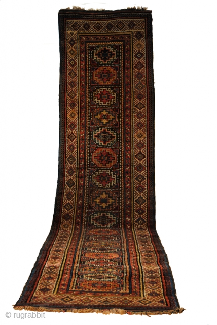 Antique Gendje or Moghan, Caucasus. 420 x 110 Cm. 14 ft.x 3.6 ft.
Collectable rug, around 1850. Memling guls. 

In fair condition. Wear acording to age. 
Some loose wires on the side. 
I  ...