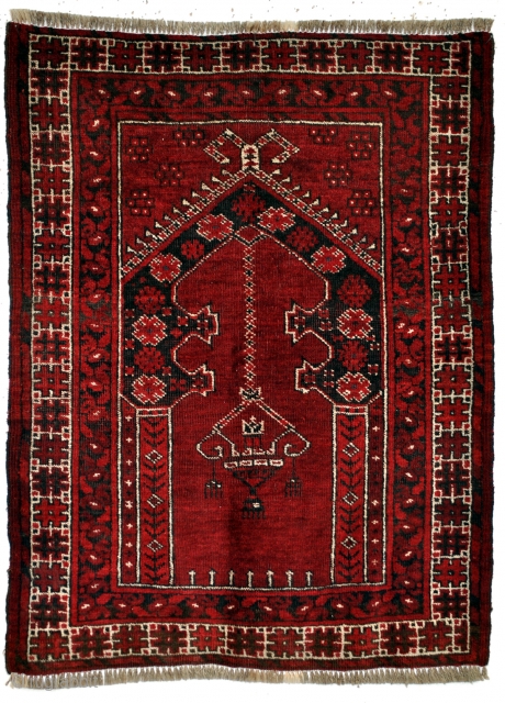 Prayer rug. 
Ersari Beshir, Middle Amu Darya area, Turkmenia.
1930 - 1940. 
In perfect condition. 
Goat wool warp. 
Little corroding in the black wool. 
Natural colors. 
80 x 110 Cm. 

ON HOLD  