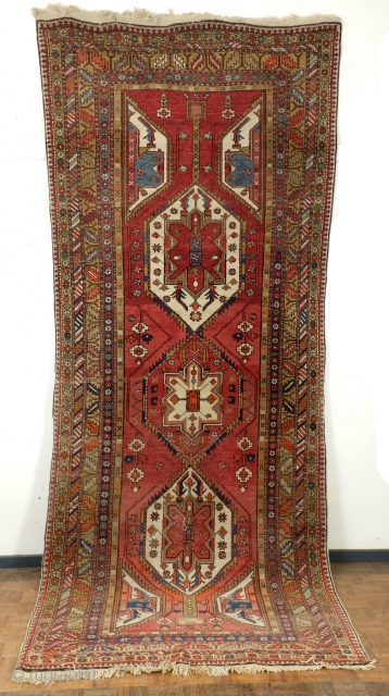 Meshkin, old, 340 x 140 Cm. Good condition. 
Very nice and wide border with zoroast'symbols like the fire toarch. 
             