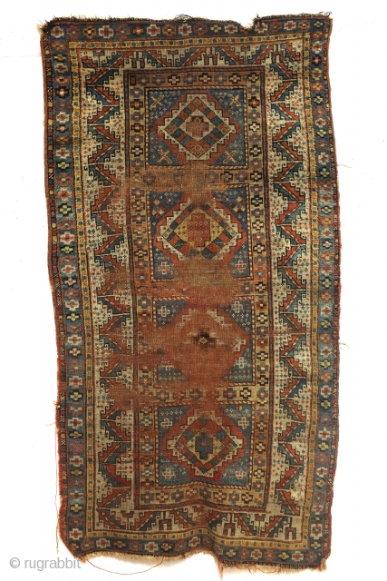 Karabach, 1900 - 1915, beautifully worn rug. 190 x 101 Cm. 
Border with Zoroast symbols, fire and fire torch. 
             