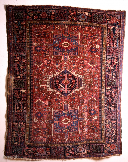 Heriz Karadja, antique 1900, left border an old repair. 
Knotted on cotton with blue wool weft. 

I like the pink contrasting with the dark indigo blue in the border. 
Would it be  ...