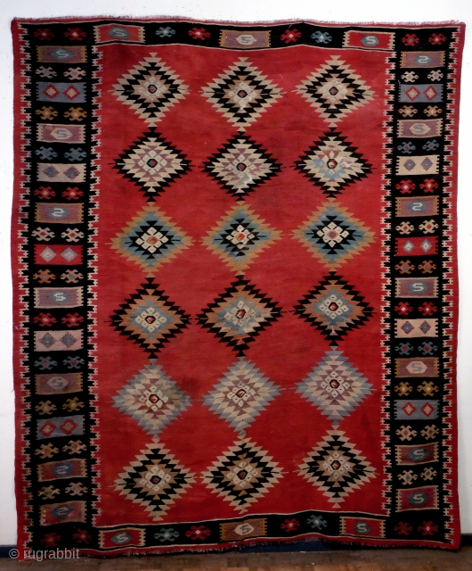 Bulgarian kilim, village Chipovtsi province Montana nort Bulgaria at de Serbian border. 
1890. Sofri design with kufari border. 
size 291 cm x 248 Cm.  9.7 feet x 8.2 feet. 
  