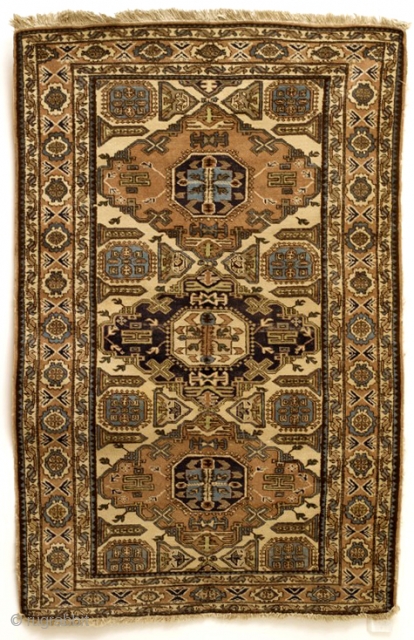 Kazak, Konaghend, Shirvan area, 125 x 225 Cm. Ivory ground, possibly a dowry gift. 
1920 - 1930. Rarely seen pattern on knotted carpets - mostly on soumacks. 
     