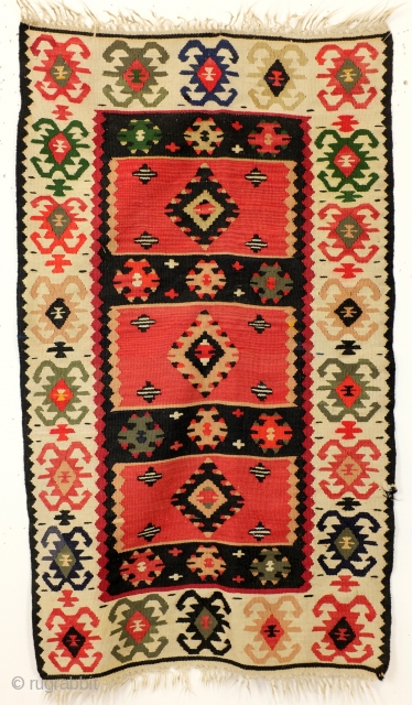 'Sarkoy' kelim. Very good condition, 145 x 80 Cm. 4.8 ft. x 2.6 ft. 
Clean, no bleeding. Mid 20th century. 
Sarkoy is the name that Turkish dealers gave to Balkan kelims. 
In  ...