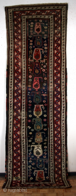 An antique Persian carpet Shahsavan (Northwest region, Azerbaijan).
Very nice elegant piece in gallery format. In the rare narrow
The main field marked in blue is made up of twelve vertically
colorful boteh variation, also  ...