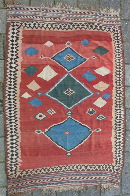Funky Qashqai Kilim, 230 x 157/150 cms., with some minor repairs. All natural dyes and also a stroke of 30 cms. with probably a synth. pink one: only there some color run  ...