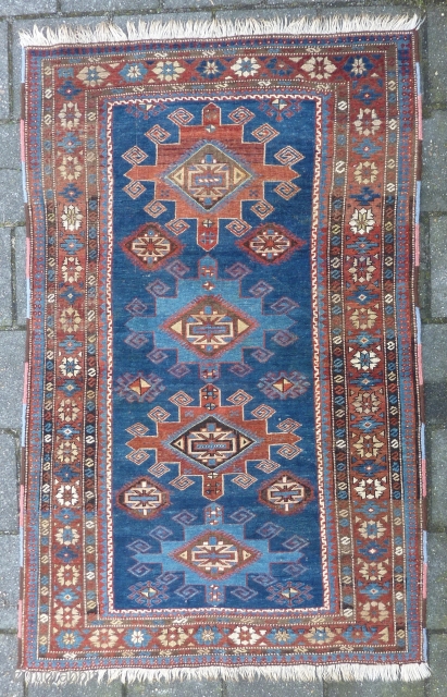 Caucasian Shirvan ca. 1900, 184  x 117 cm., 6' x 3'10". Knotted on woolen ground and with all natural dyes. With lower browns and some wear in two places ( see  ...