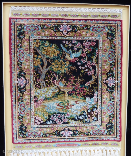Fine 15 x 15 knts. p/cm. silk on silk Hereke, signed Özipek in its original frame, Seize frame:  60  x 47 cm., Seize rug: 34  x 26 cm. Mint  ...