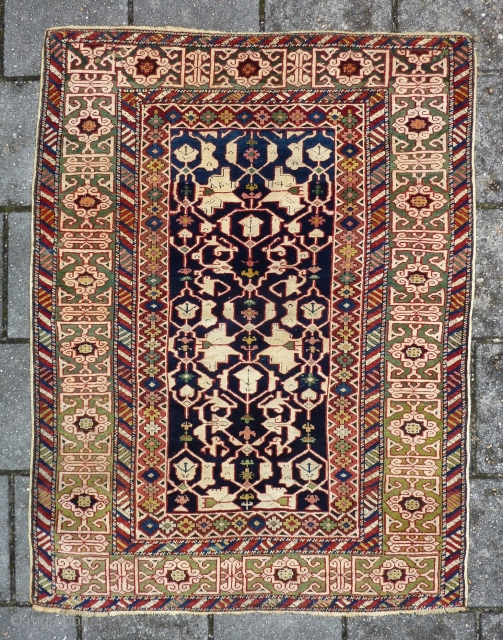 Kuba Konagkend, 130 x 100 cm., dated 1879 (1295). Good pile all over without any wear. Selvedges replaced, endings reknotted for about a half inch and two small repairs ( pictured ),  ...