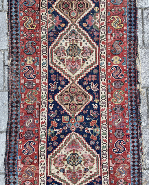 With its wide range of good, old colours, this NW-Kurdish(?) runner, 100 x 388 cm. with strong yellow and clear aubergine, might well be mid-19th c. Single wefted, wool structure, condition as  ...