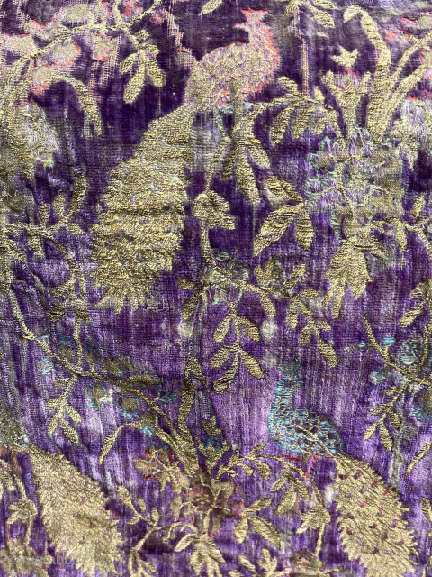 Persian leather cradle, covered with antique silk velvet, embroidered with gold thread. 82 x 122 cm. , original cross sticks available. With wear and damages. info at: robvanwieringen@telfort.nl