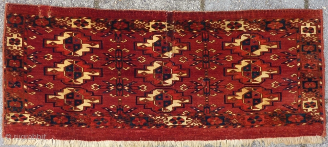 Fine Tekke Torba, 1st half 19th c. 37 x 91 cm., 15" x 36". 300 knts/sq.inch.
Full, velvetlike pile, some damages. With small dots of yellow, blue-green silk and lac dye. ( see  ...