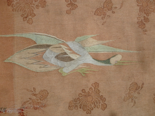 Mongolian or Kansu (?) tapestry with cranes, 2nd half 19th century,185 x 135 cm. woolen double-sided eccentric weaving and with henna painted flowering added at one side. Condition as found.   