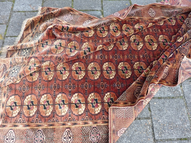 Fine Tekke turkmen rug, 243  x 178 cm., 8' x 5' 10". Incredible soft wool, like velvet, very pliable and in good condition, with full pile allover. Selvedges needs rewrapping and  ...