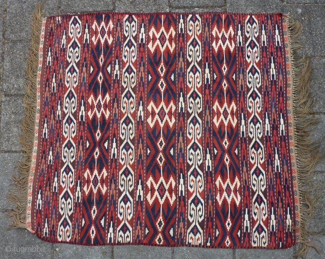 Antique Yomud Kilim, 134 c 123 cm., 4' 4" x 4'. Natural dyes and a hot red, but without colour transfer. Good condition, except for a finger tip seize hole ( see  ...