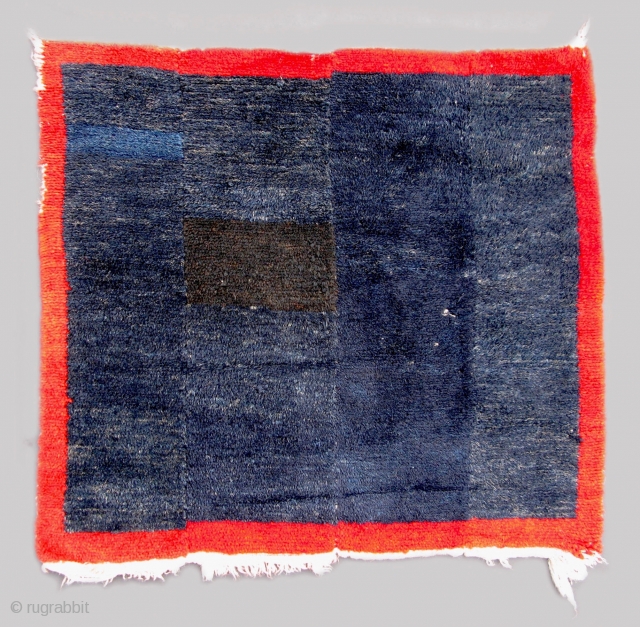 Tsukdruk: Blue w/ Red border (TC05)

32 1/2”  x  30”
4 panel Tsukdruk - early 20th c.
Well used but solid condition.  100% wool

I bought this carpet in Tibet years ago.
POR  