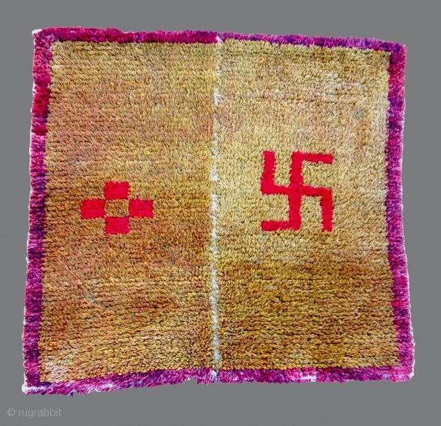 Tsukdruk: Gold w/ Red swastika   (TC08)

28”  x  27”
An interesting 2 panel tsukdruk w/ red yungdrung (swastika) design. 
Early ~ mid 20th c.
Used but solid condition.  100% wool

Collected  ...