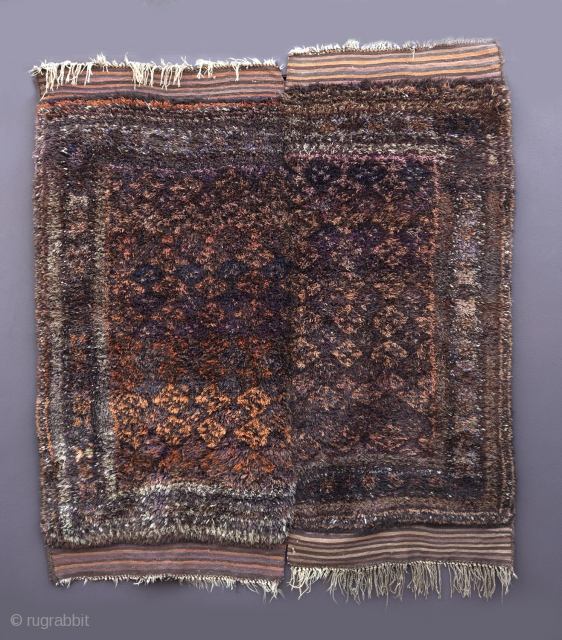 Taimani, first quarter 20th century.

No other rug in this group of two piece "bedding rugs" from Afghanistan comes close in sheer volume of wool used. The long soft pile is so closely  ...