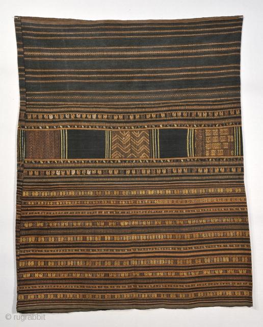Ha Li People, Hainan Island , Sputh China.  Skirt with silk brocade and embroidery on indigo ground .

Collected in Thailand 1995.  This unopened tube skirt measures 26 x 64 inches  ...