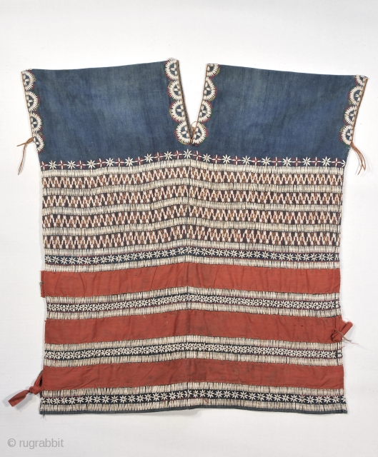 Karen Blouse - Myanmar ( Burma )  
Good old ( circa 1940-1950) Pwo Karen blouse of indigo ground cloth with applied Job;s Tears and cotton embroidery. Neck and arm area alo  ...