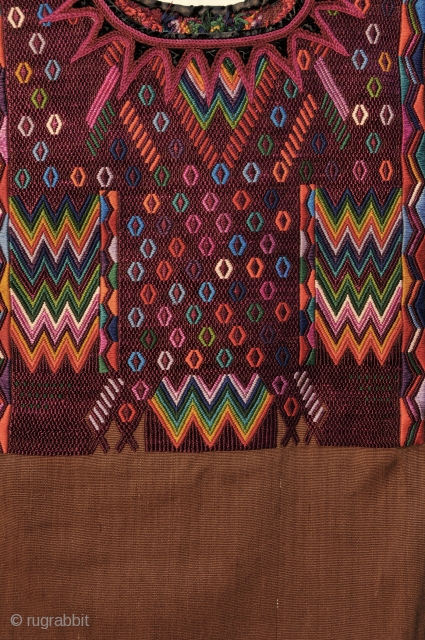 Chichicastenango Gala Huipil from Guatemala.  Exquisitely well woven piece with tight silk and cotton brocading on a brown cotton ground.  Traditional weft cording showing under brocade motifs on arms.   ...