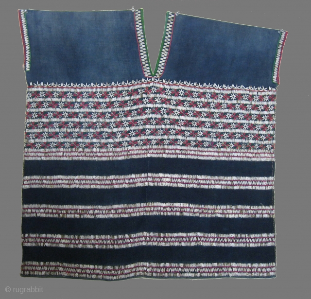 Pwo Karen Blouse - Myanmar  Indigo cotton, cotton embroidery, applied Job's Tears seeds.  Good example of Karen blouse from around 1950          