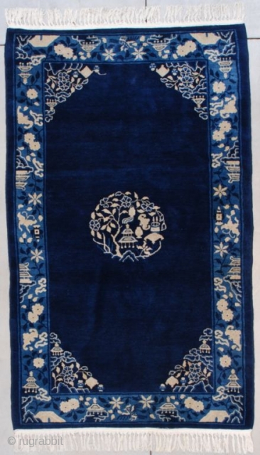 #7573 Peking Chinese Rug

This circa 1920 Peking Chinese Oriental rug measures 4’1” x 6’9” (124 x 210 cm). It has a dark blue field with a center medallion composed of a pagoda,  ...