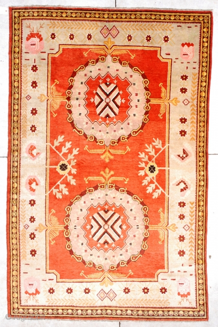 #6723 Antique Khotan Rug 5’9″ X 9’0″
This circa 1880 Khotan antique Oriental Rug measures 5 ‘ 9” x 9’ 0 “. This fantastic carpet has a bittersweet field with two medallions which  ...