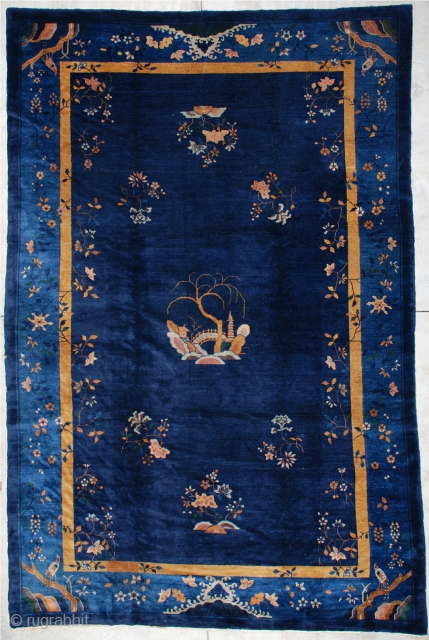 #6964 Antique Peking Chinese Rug 8’10” X 13’5″
This circa 1890 Peking Chinese Oriental rug measures 8’10” x 13’5”. It has a navy blue field with a center motif of a humpback bridge  ...