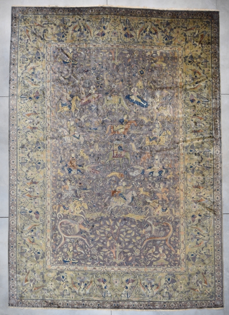 This 1st half 20th century Amritsar Carpet from India measures 14’4” X 20’3”. This rug is unbelievable. It has an absolutely gigantic hunting scene. The aubergine field is covered in men on  ...