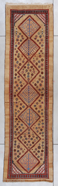 This circa 1880 Serab runner measures 3’8” X 13’5” (115 x 410 cm). It is an absolutely fantastic camel hair runner. There are seven diamonds up the center, each with a different ...