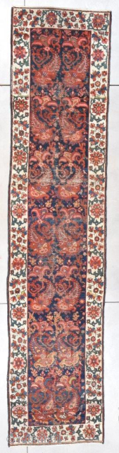 This circa 1890 Bakhtiari Luri Runner Oriental Rug measures 3’8” X 16’3” . It has a beautifully drawn boteh design which is repeated up the field of the rug. The boteh is  ...