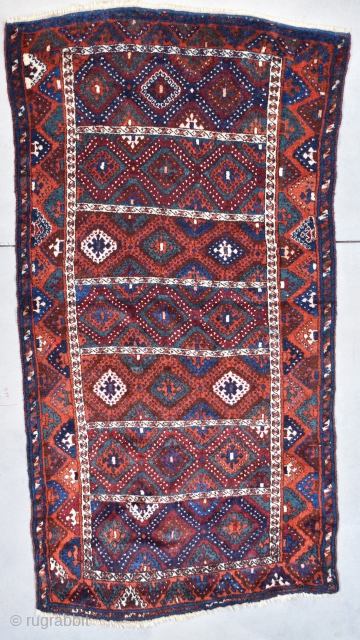 #7748 Antique Yoruk Turkish Rug This last quarter 19th century antique Yoruk Oriental Turkish carpet measures 4’3” x 8’0” (131 x 244 cm). It has a panel motif with seven diamond filled  ...