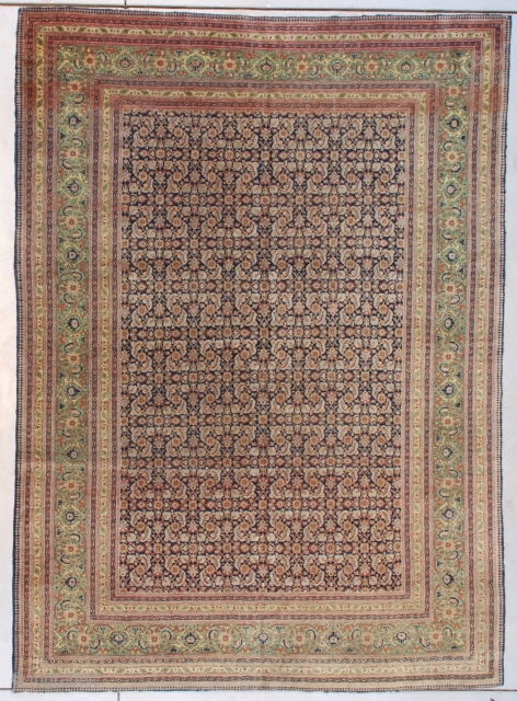 This circa 1890 antique Fereghan Sarouk #7631 Oriental Carpet measures 5’9’ X 8’0” (179 x 243 cm). It has a beautifully drawn Herati motif in pale blue and rust on a dark  ...