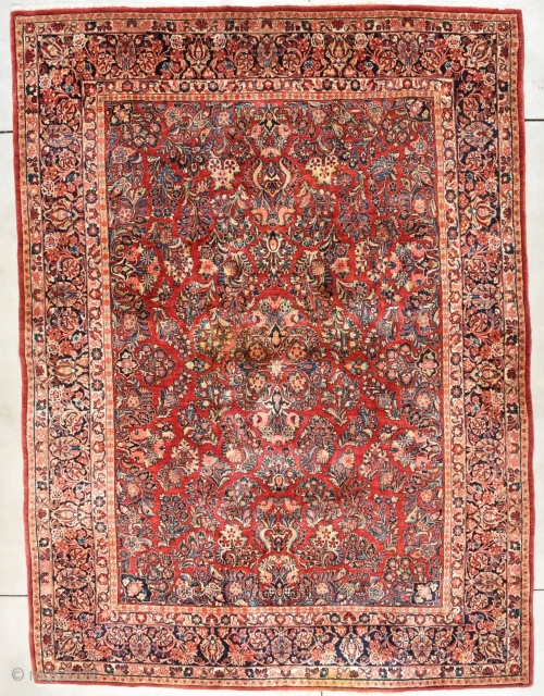 Antique Sarouk Persian Rug 8’8” X 11’9” # 7989
This circa 1920 Sarouk measures 8’8” X 11’9”. It has an overall floral design which is very nicely drawn on a very happy ruby  ...