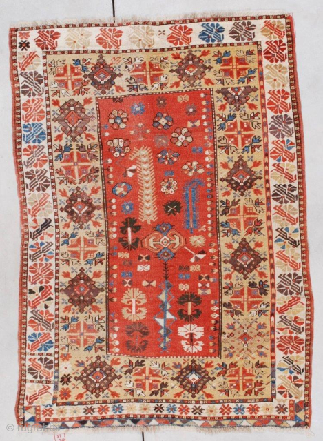 This 1st quarter 19th century Melas or Melez antique Oriental rug measures 3’6” X 4’11” (109 X 155cm). It has a light rust or dark coral field with a tree of ...