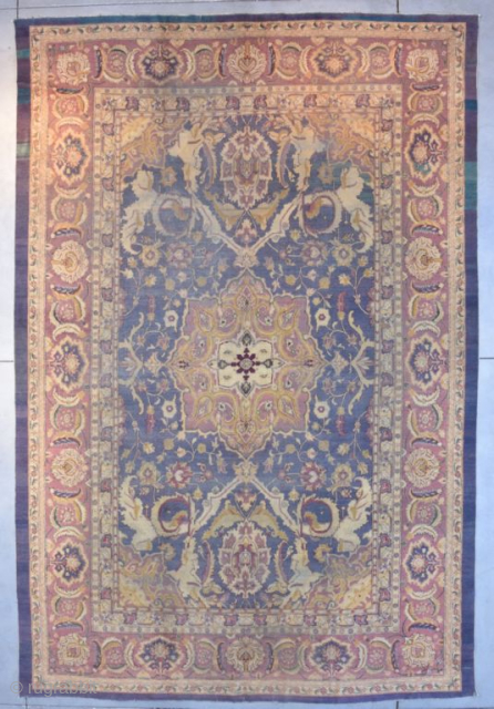 This circa 1880 Agra handmade wool Oriental Rug measures 9’10” X 14’7”. I honestly cannot put a name on the background color of this rug. It is some shade of blue combined  ...