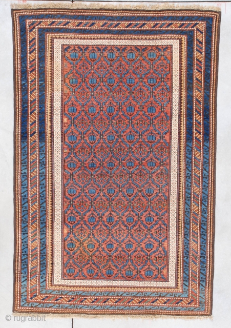 #7332 Kuba Antique Caucasian Oriental Rug This last quarter 19th-century Kuba measures 3’8” X 5’8”. It has a rust to terra-cotta colored field with hexagonal repeated compartments ala Marasali Shirvan containing blue  ...