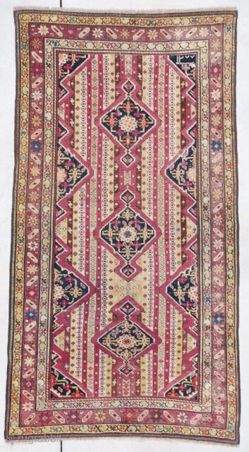 This Karabaugh #7400 is dated 1870 and measures 2’11” X 5’4” (89 x 164 cm). This is a very early provable date for this type of rug. It has three elongated diamonds  ...