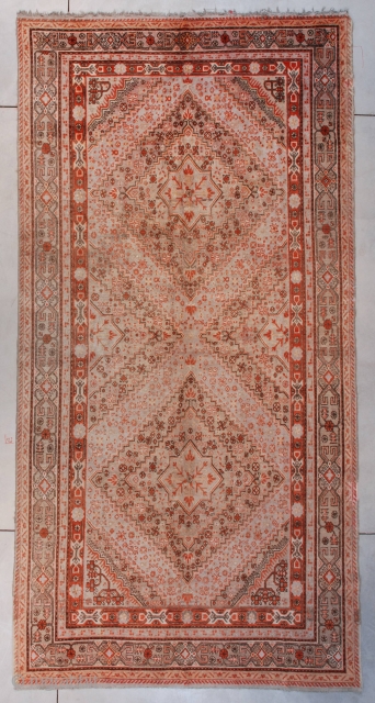 #7393 Khotan
This circa 1920 Khotan measures 6’6” X 12’10” ( 201 x 406 cm). It has two large diamond medallions on a very pale blue ground. The diamonds have a kaleidoscopic effect  ...