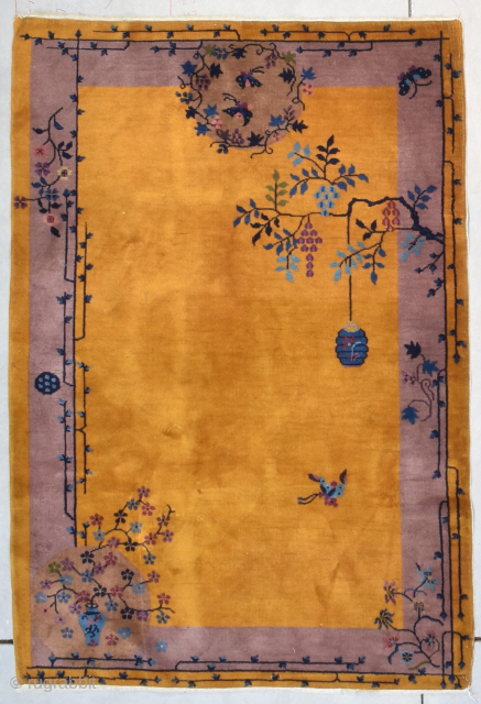 This circa 1925 Art Deco Chinese handmade wool Oriental Rug #8171 measures 4’1” X 6’0”. It has a beautiful yellow gold field encompassed by a pale purple border. It has a nicely  ...