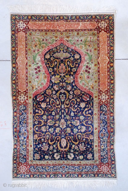 #7597 Hereke

This silk and metal  Hereke measures 3’3” X 5’2” (100 x 158 cm). It has a blue field with a cloudband motif and flowers. The spandrels are a pale shade  ...