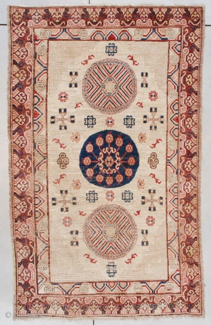 #7509 Antique Khotan Rug
This Khotan Oriental rug measures 5’0” x 8’1” (152 x 246 cm). It has a pale camel field containing three medallions. The corners are worked in a modified Greek  ...
