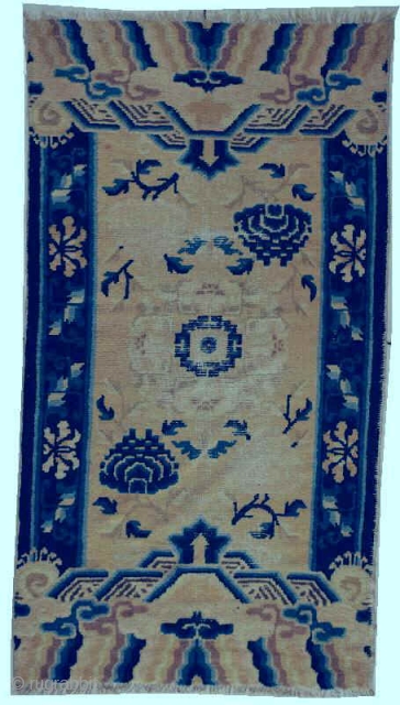 #5935 Antique Ningxia Chinese Rug
This circa 1800 Ningxia antique Chinese Oriental Carpet measures 2’11” x 5’2”. It has a center medallion in ivory with a blue center with either blue or pink  ...