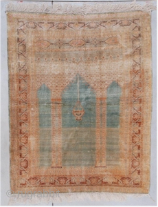 This circa 1880 silk Sivas prayer rug #7297 measures 4’2’ X 5’5’. It is the coupled column variety on a turquoise ground with a nice abrash running through it.  The spandrels  ...