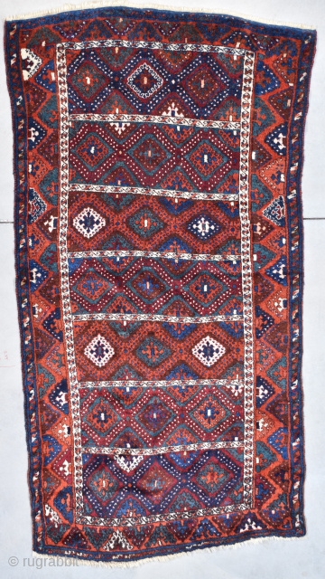 This last quarter 19th century antique Yoruk Oriental Turkish carpet #7748 measures 4’3” X 8’0” (131 x 244 cm). It has a panel motif with seven diamond filled panels that are each  ...