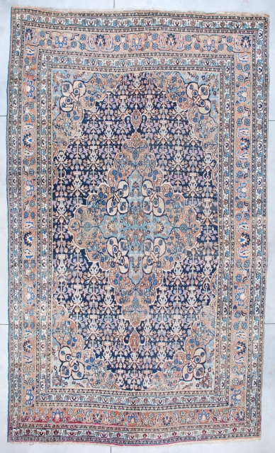 #6942 Khorassan

This circa 1880 Khorassan measures 10’1” X 17’3”. It has a large lobed pulled medallion with a sky blue center surrounded by peach, filled with meandering vines and flowers and large  ...