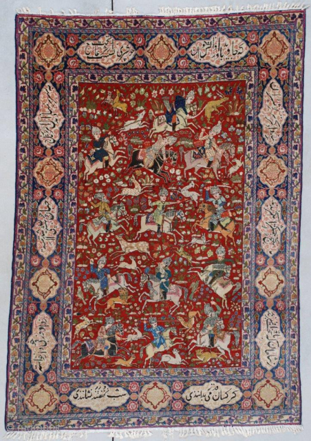 #7383 Tabriz antique Persian rug 'Hunt Scene' This circa 1910 Tabriz measures 4’2” x 6’3” (128 x 192 cm). It has a hunting scene on a tomato red ground completely filled with  ...