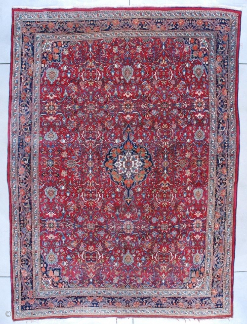 #7534 Room Size Bidjar Oriental Rug 
This circa 1930 Bidjar Persian Oriental Carpet measures 8’9” X 11’10” (271 x 363 cm). It has a medium red to maroon field with a Herati  ...